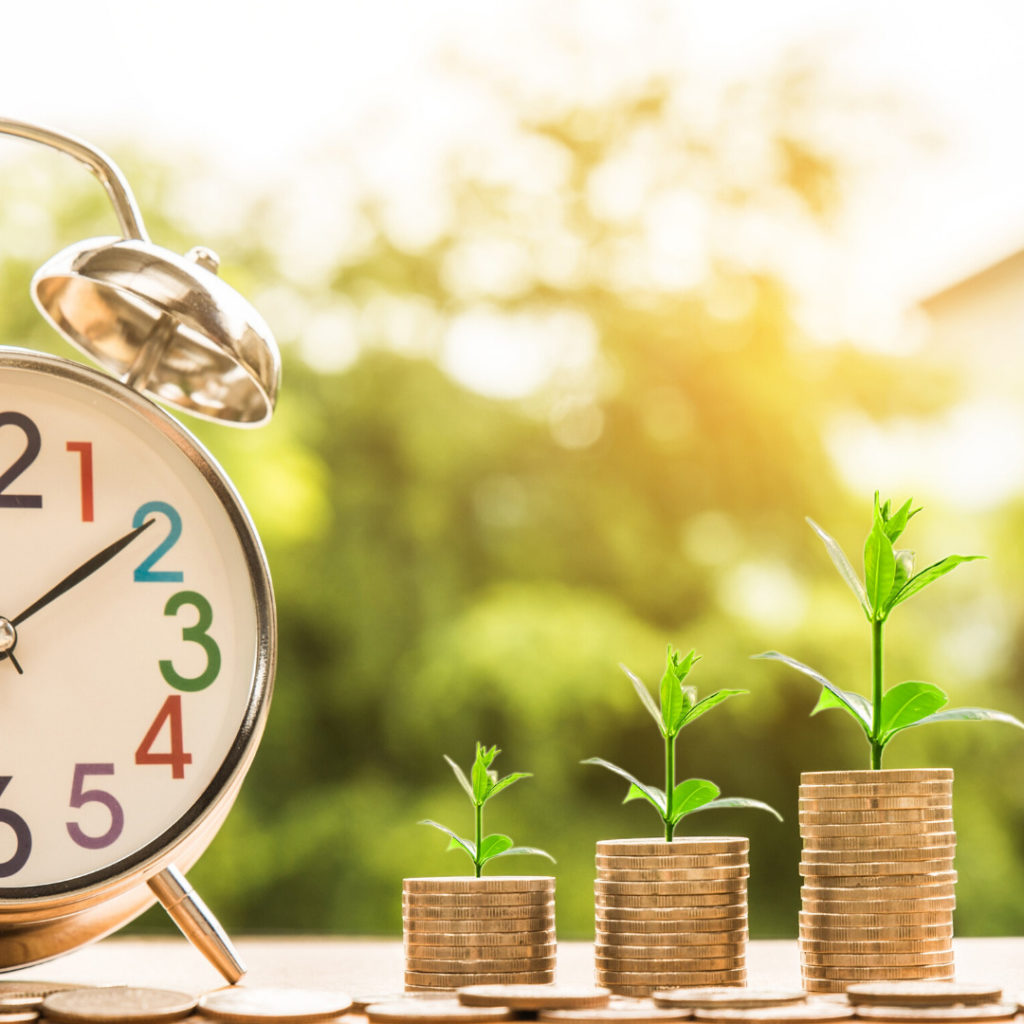 Clock with wages next to it 